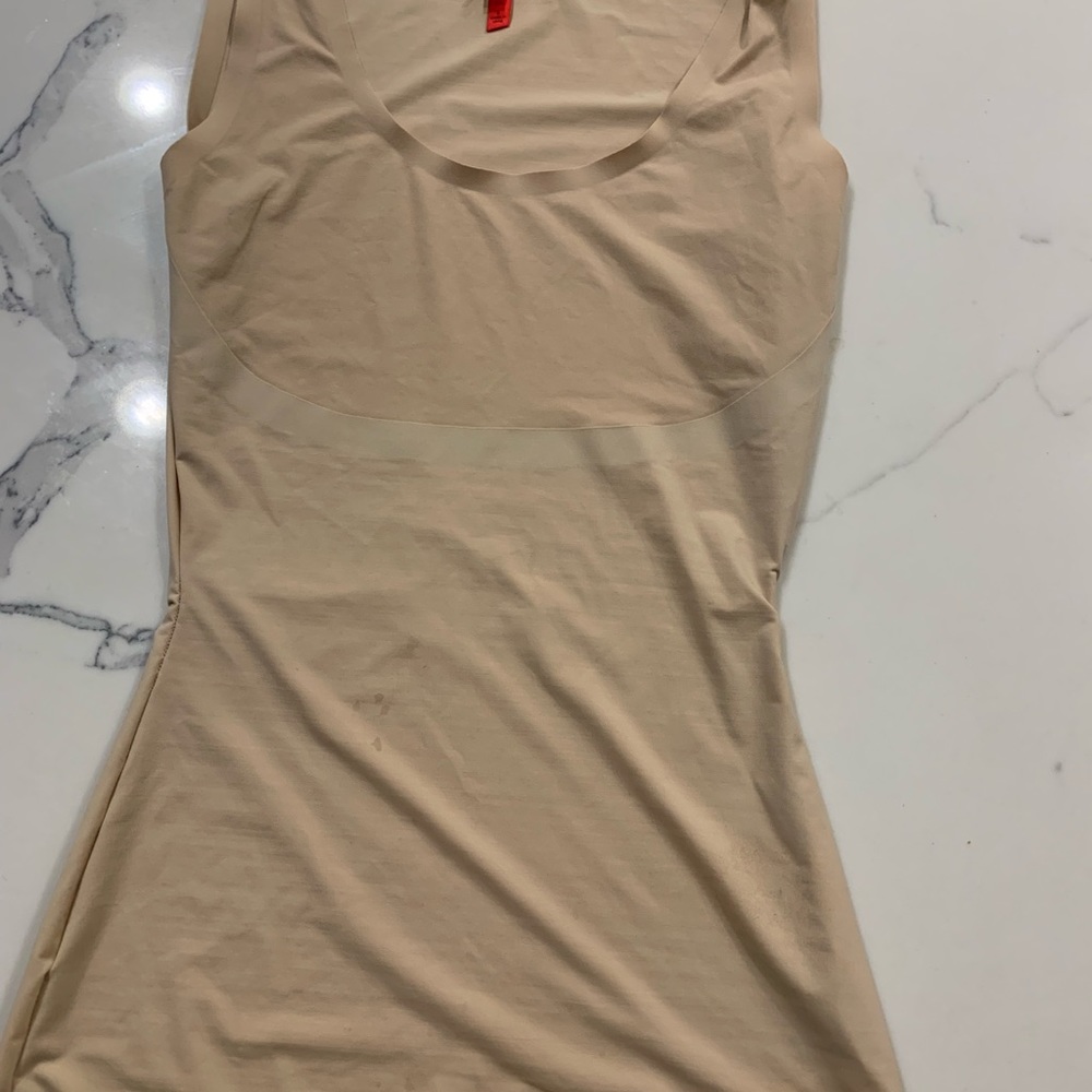 Spanks body smoothly undergarment with built in bra.size S